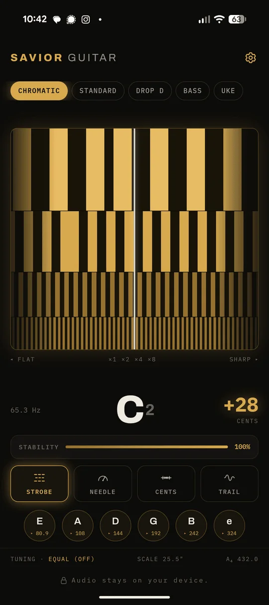 Savior Guitar Tuner: Pro strobe display on a phone, showing the note, cents offset, and rolling strobe bands