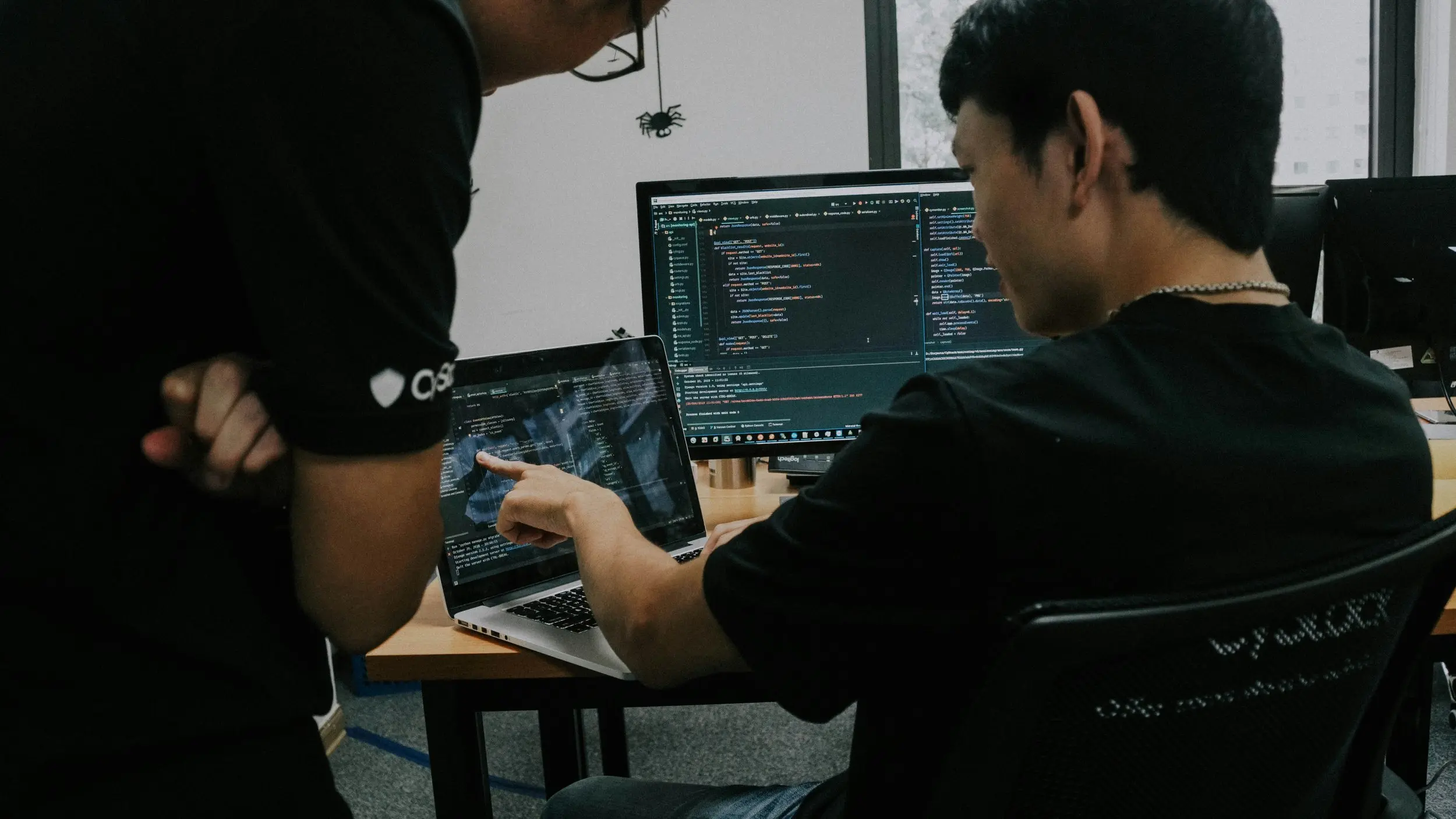 Software developers collaborating